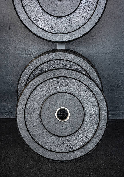 istock barbell discs in  an athletic gym 2238112972
