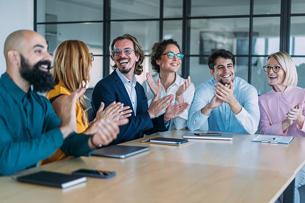 istock Businesspeople applauding during a seminar in conference hall. 2238113757