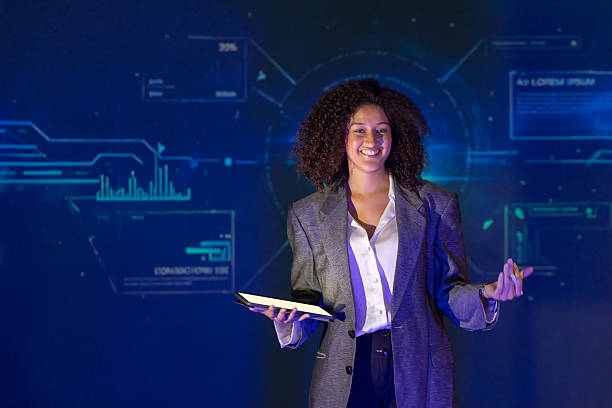 istock Speaker in a professional outfit presents the business technology concepts at a technology conference 2238114053