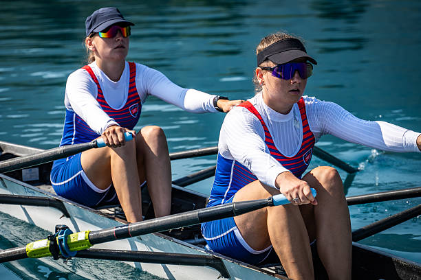 istock Medium Shot of Determined Women Competing in Synchronized Rowing 2238115835