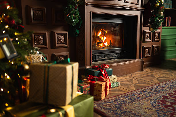 istock Many gift boxes in classical Christmas decorated interior living room library with fireplace. Christmas gift near fir tree. Modern classic style interior design apartment. Christmas eve at home. 2238117228