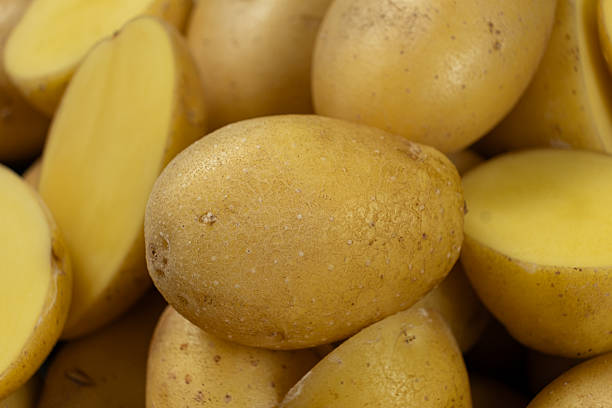 istock Fresh raw unpeeled potatoes close-up 2238119173