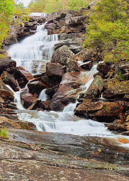 istock Cascading waterfall flows over large rocks . Dalen,Norway 2238120160