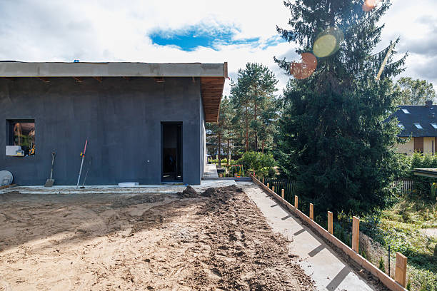 istock Unfinished Modern Building with Flat Roof and Construction Tools 2238122978