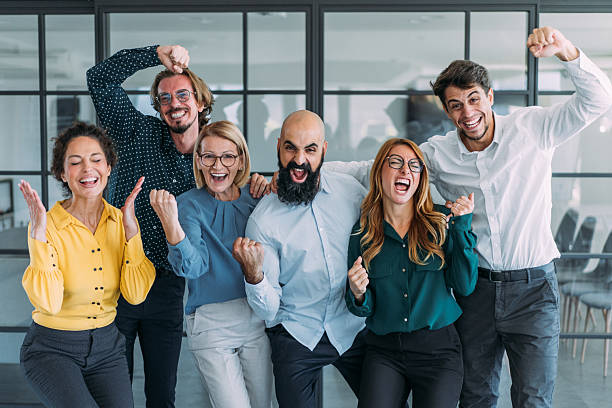 istock Cheerful entrepreneurs celebrating success in the office. 2238123049