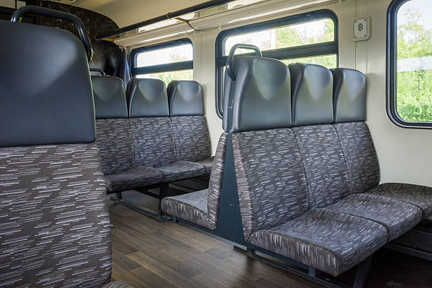 istock Passenger train with empty seats, no people 2238131199