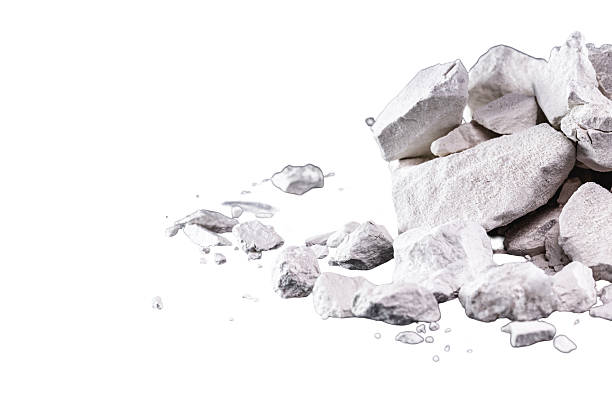 istock Calcium and Magnesium stones, white background. Called virgin lime or quicklime 2238135071