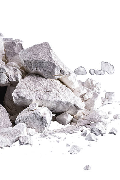 istock Calcium and Magnesium stones, white background. Called virgin lime or quicklime 2238135074
