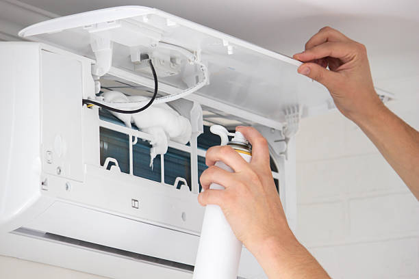 istock Deep AC Cleaning. Treating the Evaporator with Cleaning Foam 2238137566