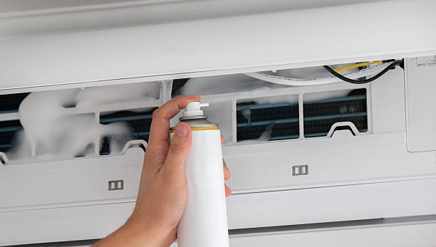 istock Deep AC Cleaning. Treating the Evaporator with Cleaning Foam 2238137567