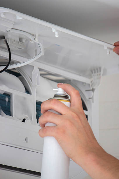 istock Deep AC Cleaning. Treating the Evaporator with Cleaning Foam 2238137573