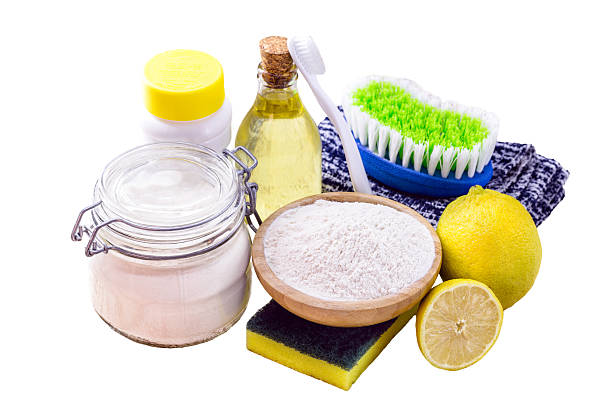 istock vinegar with lemon , bicarbonate of soda on kitchen sponge on white isolated background 2238138204