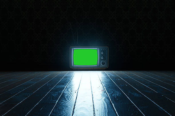 3D Rendering of an old television with igreenscreen on wooden planks at night