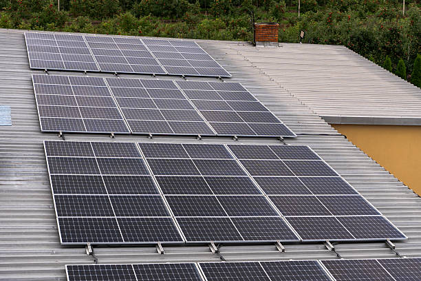 istock Solar panels installed on a large industrial hangar roof 2238138986