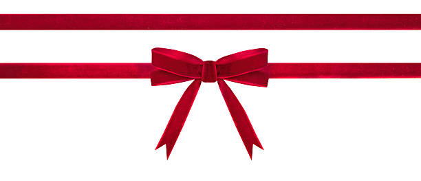 Red velvet ribbon bow isolated,cutout.Christmas gift decor.