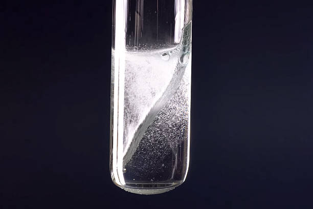 istock Laboratory flask with a tungsten plate in alkali 2238141310