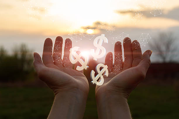 istock Hands reaching for dreams under a golden sunset sky 2238146804
