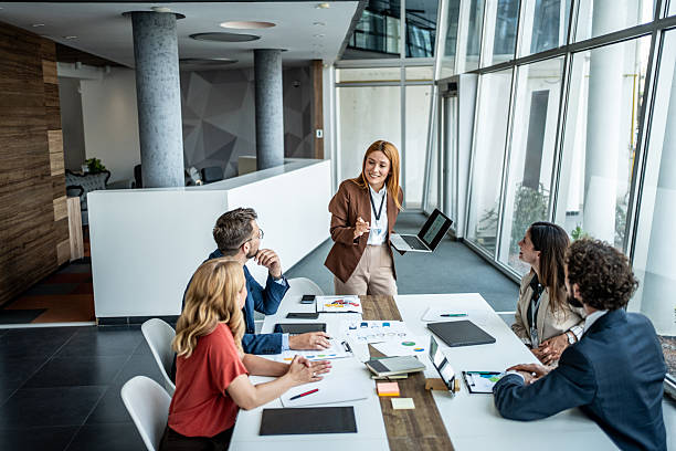 istock Businesswoman presenting data during an important office meeting 2238150095