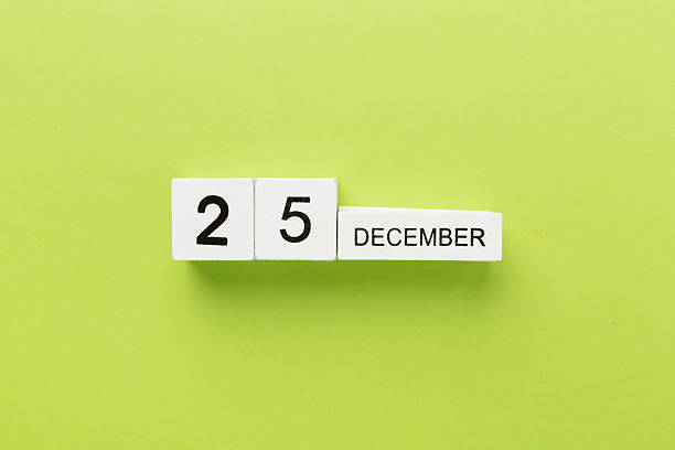 istock Calendar with date December 25 on color background, top view 2238151076