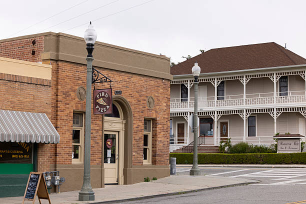 Piru, California, USA - March 24, 2024: Cloudy afternoon sun shines on buildings the historic downtown district.