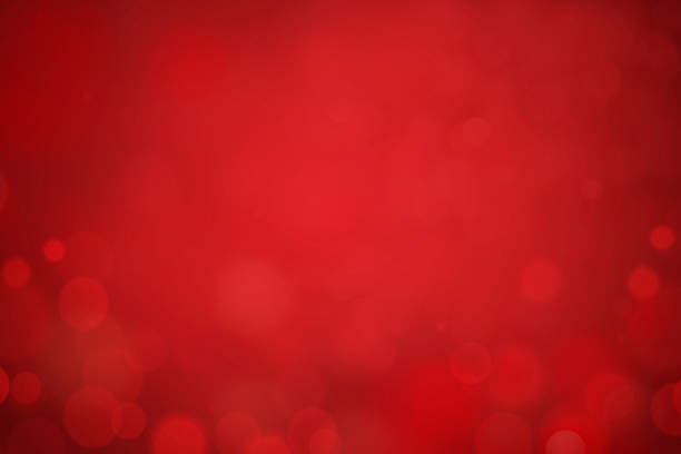 Red defocused lights with space for copy. Can be used as a Christmas or some other holiday background.