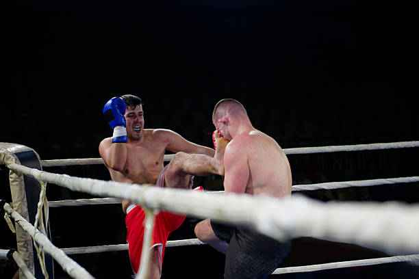 istock Fierce boxing match showcases athletes' power and skill. 2238160130