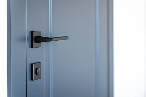 istock Blue interior door. Sleek handle. Light minimalism. 2238161653