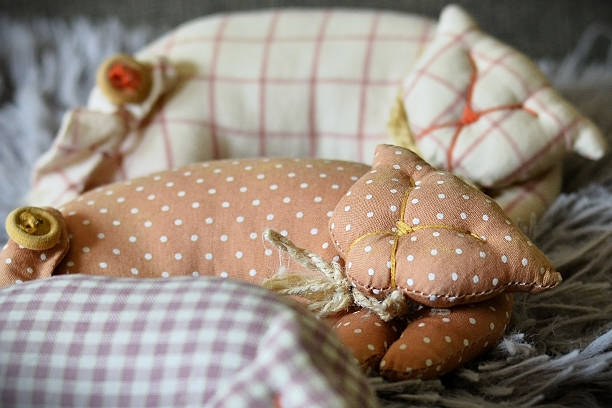 Details of kittens handmade with different fabrics