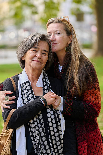 istock A Heartfelt Embrace: A Daughters Support for Her Mother on a Beautiful Autumn Day. 2238178259