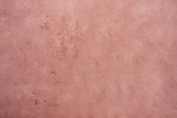 istock Pink plaster acquiring aged concrete wall surface texture 2238183540