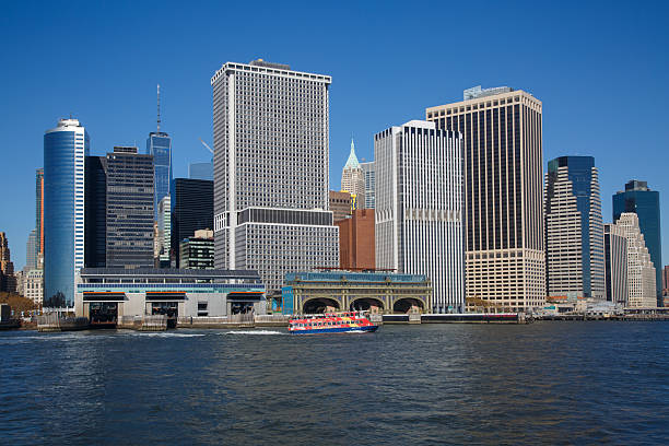 A Tourboat at the Iconic Financial District,  downtown Manhattan, New York City, United States