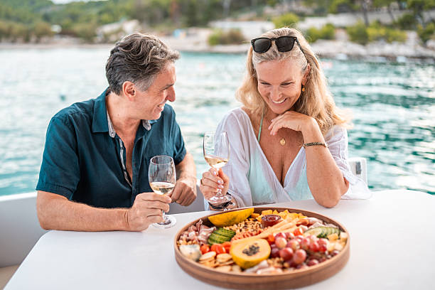 istock Mature Couple Enjoying Wine on Adriatic Coast 2238190686