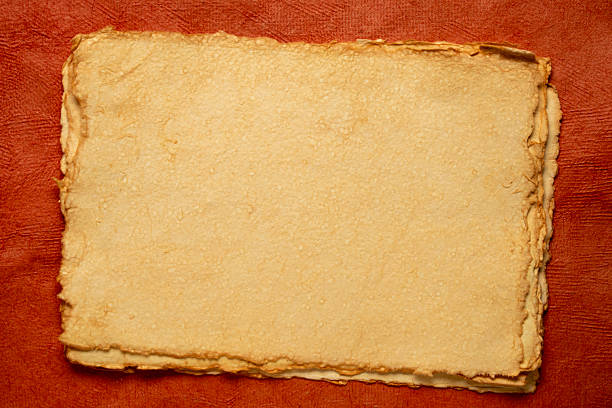 burning paper, glowing edge of paper on a black background