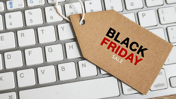 Black Friday Sale Tag on Computer Keyboard Keys Symbolizing Online Shopping and E-commerce Discounts
