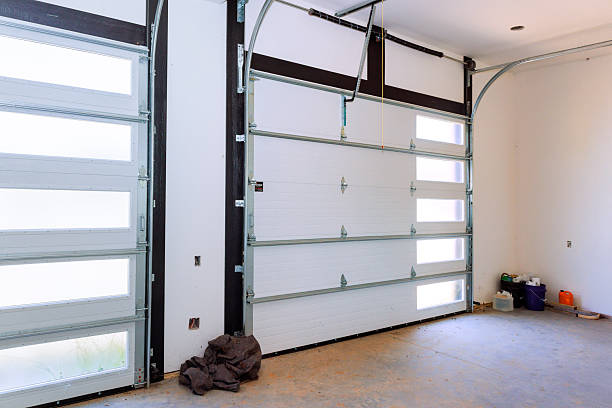 istock Spacious garage interior with large windows for natural light in residential home 2238210393