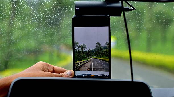 istock Raindrop-speckled scenery and lush greenery from inside a car, as winding roads unfold through the misty Western Ghats of Tamil Nadu, India—perfect for themes of travel, adventure, and nature explore 2238215756