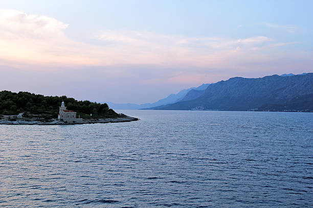 Sucuraj, Croatia - August 20 2025: Scenic Lighthouse Sunset Landscape in Hvar Island, Sucuraj, Croatia