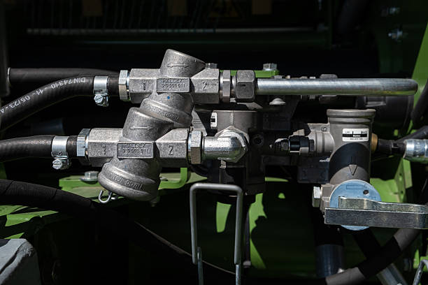 istock Omsk, Russian Federation - July 30, 2025: Industrial hydraulic system components featuring metallic valves and hoses, showcasing intricate engineering and design in a machinery setting 2238218340