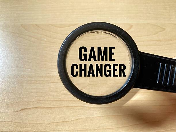 istock Magnifying glass and Game Changer word. 2238220436
