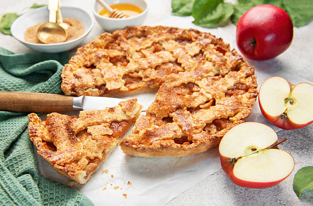 istock Homemade apple pie with ingredients on concrete background 2238222887