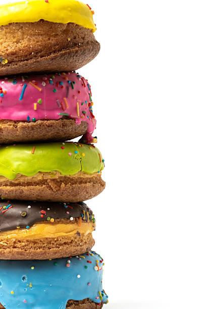 istock Colorful donuts isolated on white background. Close up shot. 2238225033