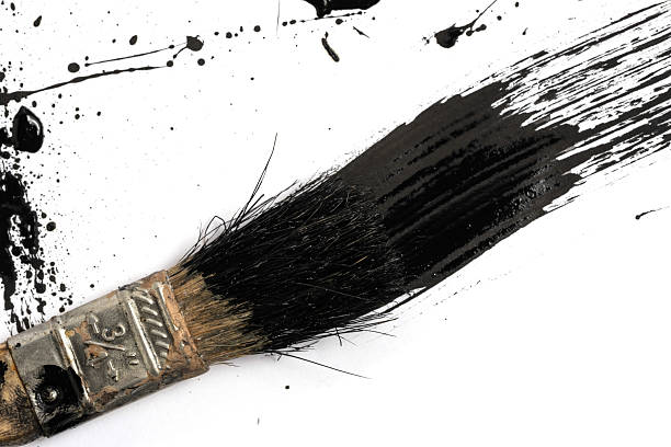 istock Paint brush with black paint on white background. Closeup. 2238225069