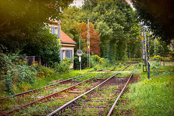 Beautiful European countryside autumn and old iron railroad rails. Transportation and travel in Poland