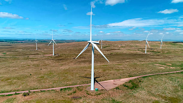 istock Construction and assembly of wind generators in fields with meadows and lakes 2238227313