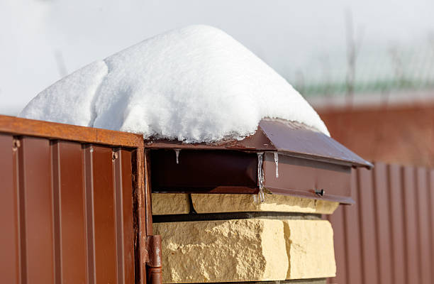 istock A metal fence with a brown roof 2238228718