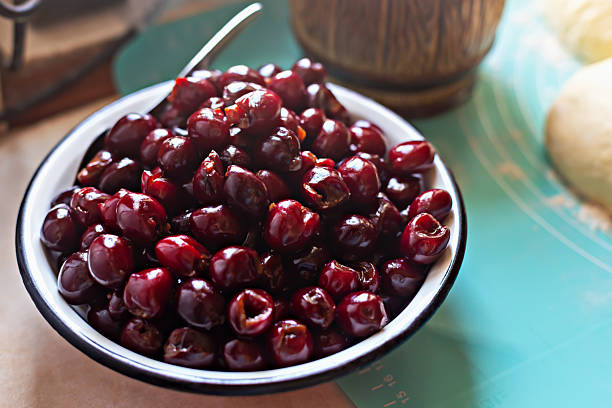 istock Freshly harvested cherries in rustic bowl ready for baking delicious pies and desserts 2238234937