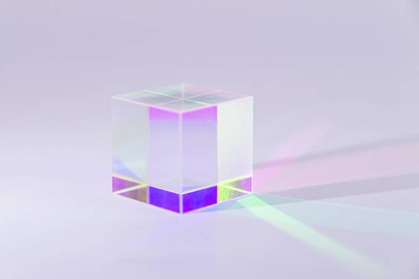 istock A translucent cube reflects light, casting a spectrum of colors 2238237420