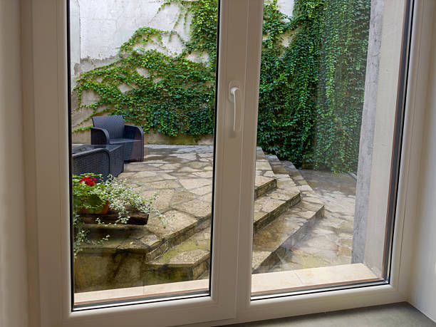 istock View from inside through the window to the adjoining patio 2238237655