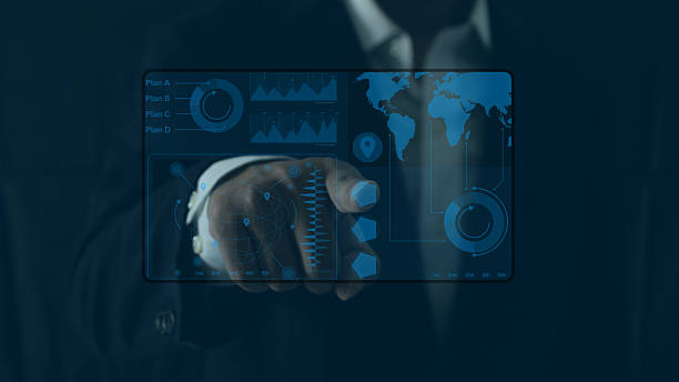 istock Businessman interacting with futuristic digital interface showing global stock chart, world map, and data analytics, symbolizing global economic strategy and business planning 2238245838