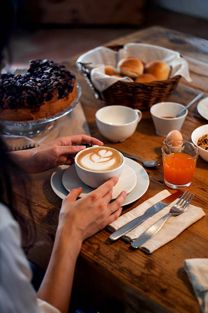 istock Rich B&B breakfast: cappuccino with latte art and cake 2238248741